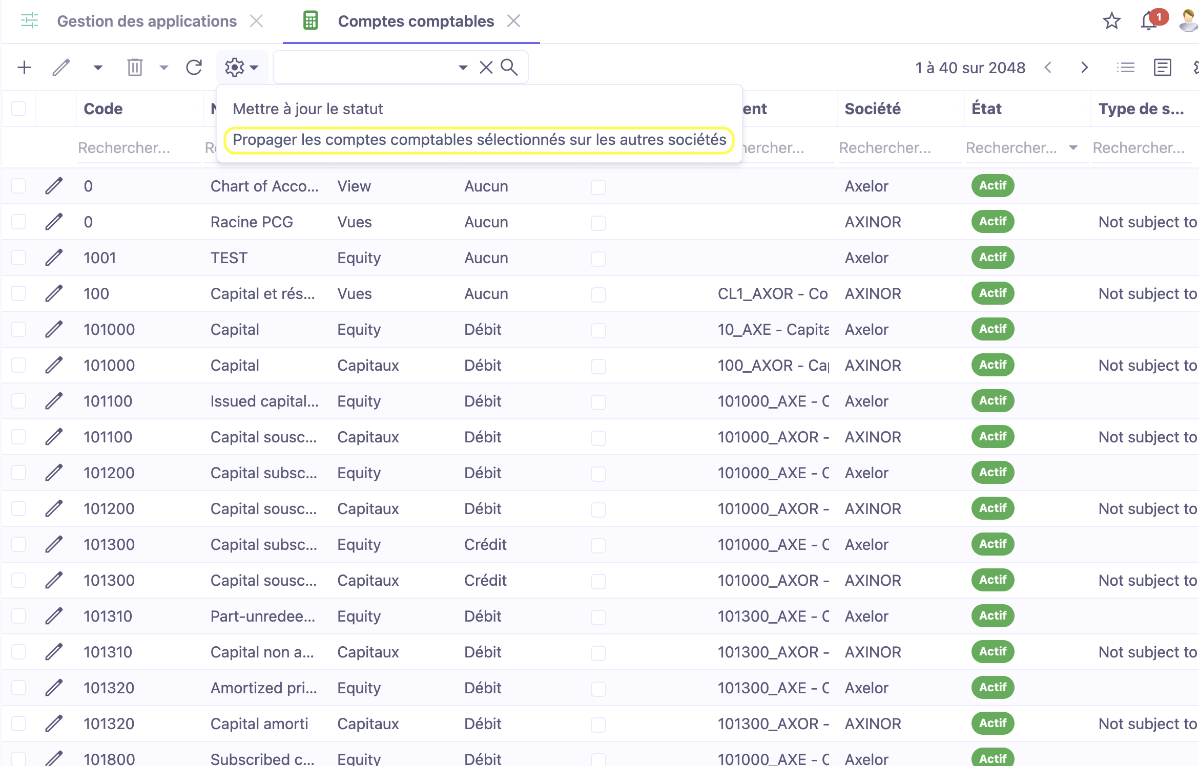 1.1. Dans le menu Comptes Comptables vous trouverez une nouvelle option, Propager les comptes comptables sélectionnés sur les autres sociétés. Ce bouton est accessible soit depuis la vue Liste, soit depuis la vue Formulaire. Le bouton se situe en haut de la page (cliquer sur l’icône de  rouage).